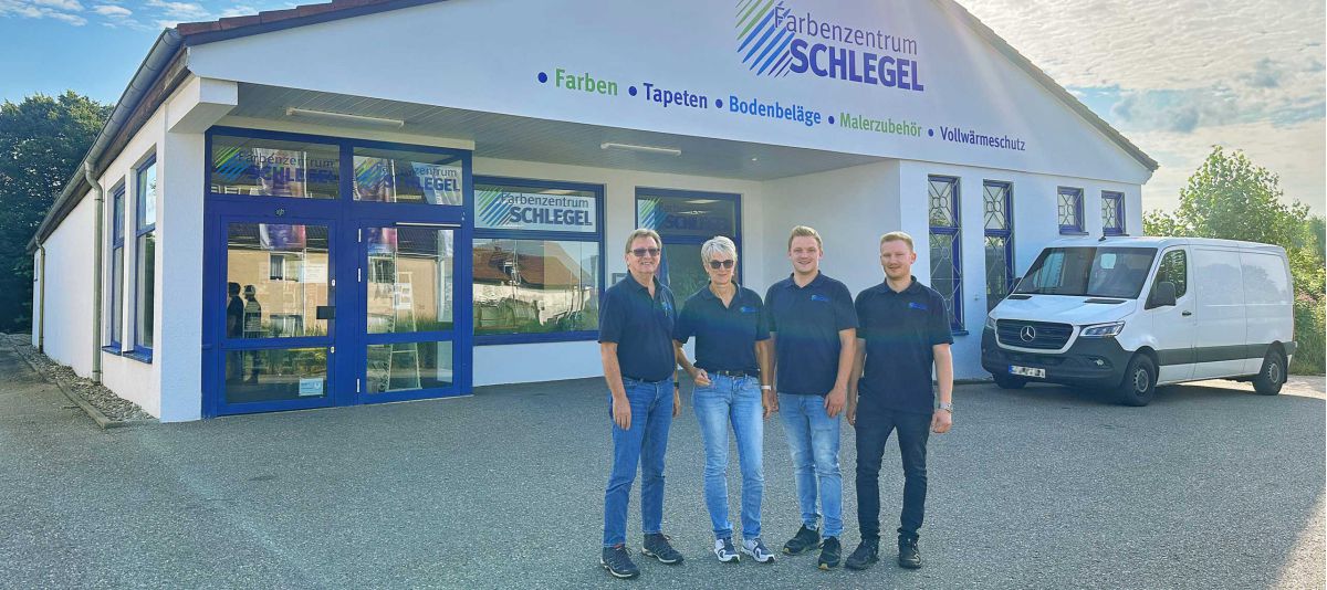 Farbenschlegel Ladengeschäft Aussenansicht mit Besitzer und Transporter