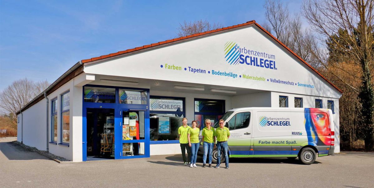 Farbenschlegel Ladengeschäft Aussenansicht mit Besitzer und Transporter